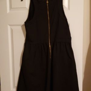 Black cocktail dress with pockets and back zipper